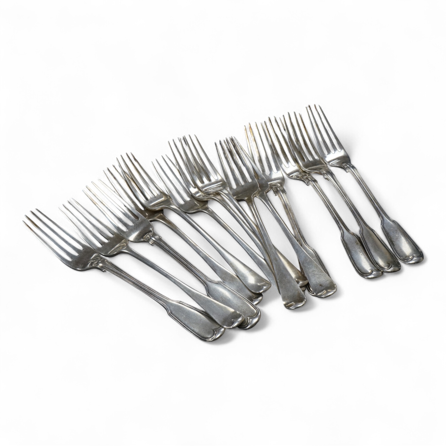 A set of eight George IV provincial silver Hanoverian pattern dessert forks by John Brown, Newcastle, 1822, 16.6cm, together with a set of six early 19th century silver fiddle and thread pattern dessert forks, William Ch